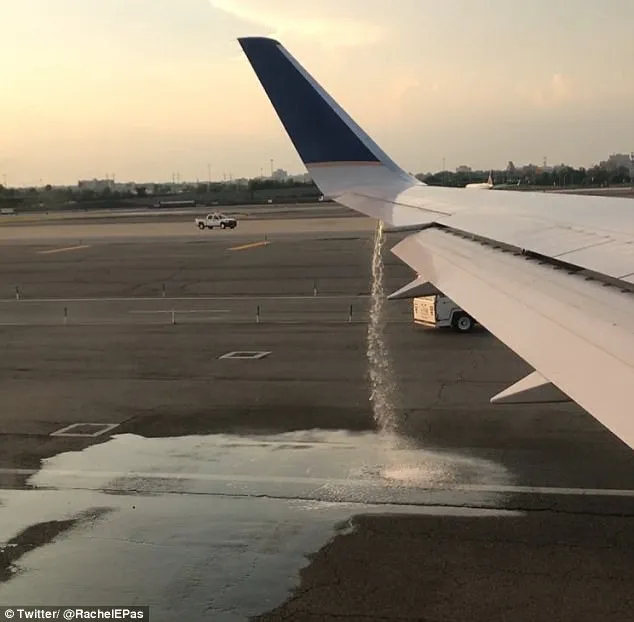 Jet fuel spilling out of a Boeing 737 rapidly, just at the outer edge of the wing